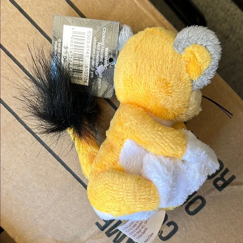 Yellow and Gray Stuffed Animal Toy